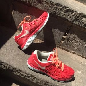 Cute pink Nike athletic sneakers